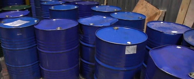 Photo of confiscated drums of counterfeit lubricants